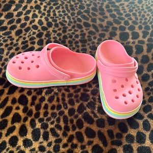 Crocs pink with multi colored stripes